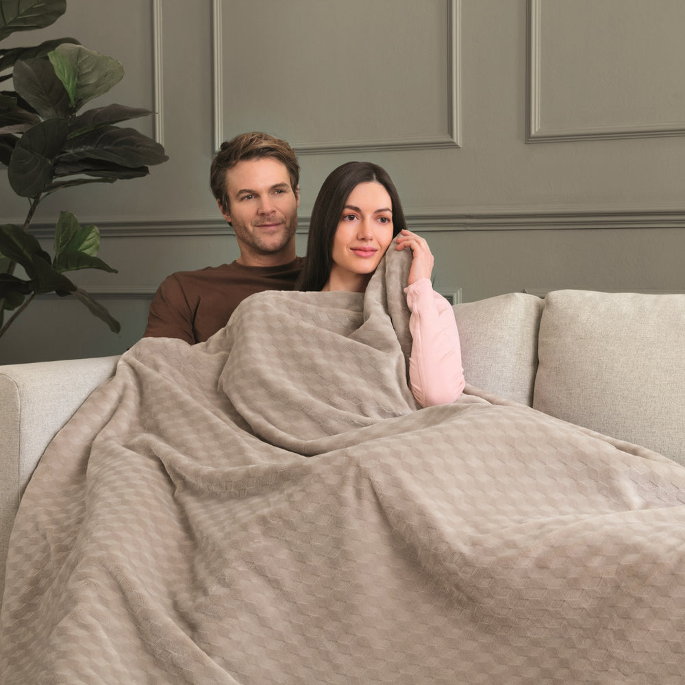 couple under the Indulgent Days XL Warming Throw