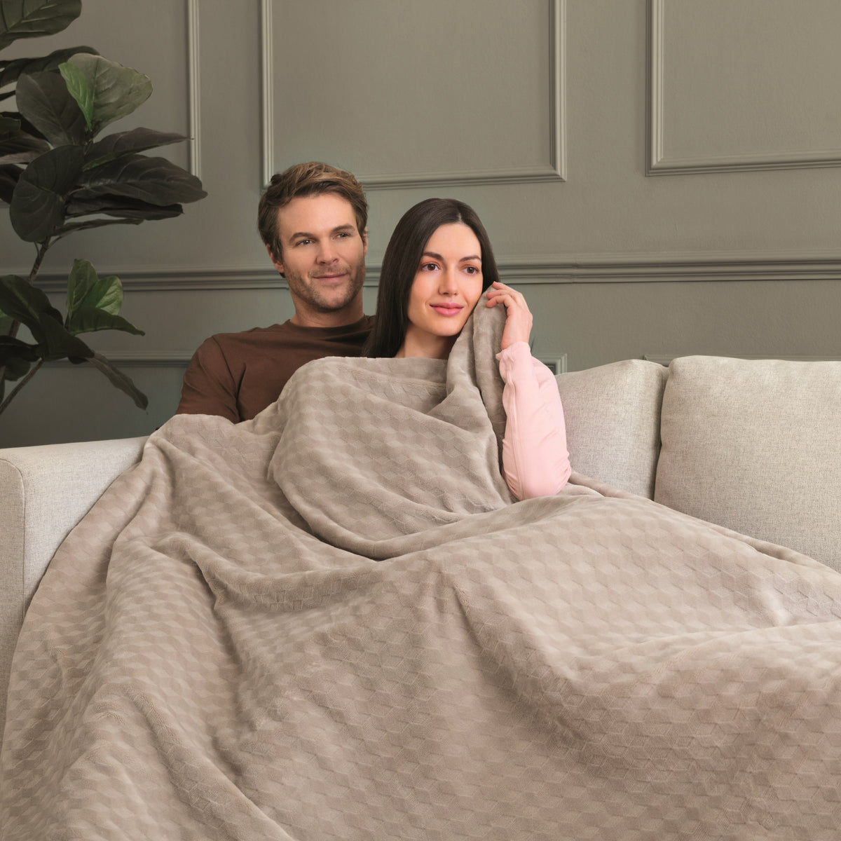 couple under the Indulgent Days XL Warming Throw